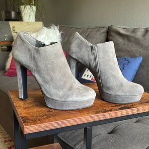 Grey suede platform booties by Gianni Bini